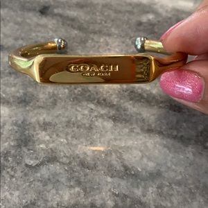 COACH open cuff bracelet.